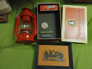 lot 718 image: Lantern, Wooden Nickle, Pocket Knives, Harmonica