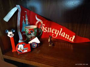 lot 778 image: Vintage Disneyland Lot- Mickey Mouse, Minnie Mug, Two Pennants, Etc