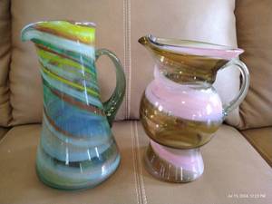 lot 843 image: Two Hand Blown Glass Pitchers