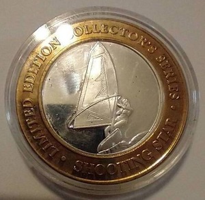 lot 952 image: Shooting Star Casino $10 Silver Strike Gaming Token