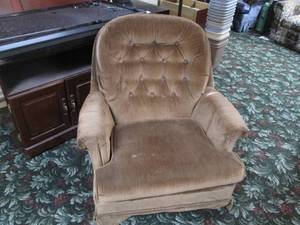 lot 274 image: Plush brown chair...