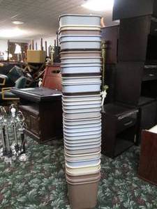 lot 278 image: Tall stack of small trash cans...