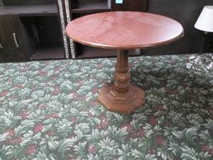 lot 314 image: Table with metal base measuring 33 across