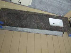 lot 357 image: Granite countertop with sink, measures 80.5 x 22
