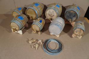 lot 133 image: 8 Mini Whiskey Barrels with Stands
