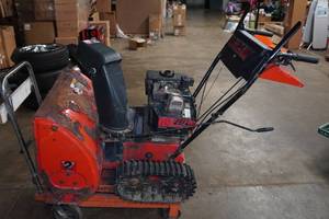 lot 152 image: Yard Machines 8 HP Tracked Self Propelled Snow Thrower