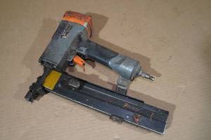 lot 210 image: Paslode Air Siding Stapler