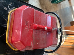 lot 28 image: Gas can, hunting books, bale hooks and more