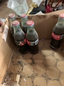 lot 31 image: Coke bottles