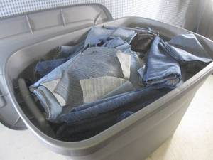 lot 211 image: (F-1) 18 Gallon Tote Full of Denim Material with Lid