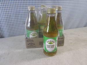 lot 307 image: (B-1) 6 Bottles Roses Sweetened Lime Juice From Concentrate12oz Past Date