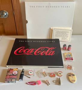 lot 99 image: MAIN - Coca-Cola Memorabilia Collection The First Hundred Years Book with Miscellaneous Collectibles