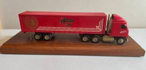 lot 105 image: MAIN - 1994 Coca-Cola Collectors Club Atlanta 94 Semi Truck Model on Wooden Mount