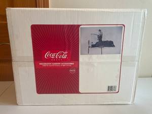 lot 113 image: MAIN - Coca-Cola Decorative Garden Accessory - Boy Fishing Whirligig