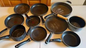 lot 251 image: MAIN - Assorted Used Cookware Lot - Frying Pans and Sauce Pans