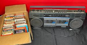 lot 479 image: BASEMENT - Vintage Boombox with Cassette Playback and Collection of 8-Track Tapes
