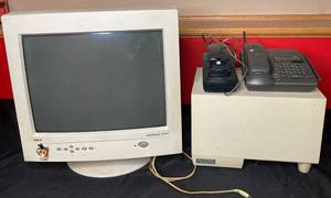 lot 480 image: BASEMENT - Lot of Office Electronics NEC MultiSync Monitor, Sony Cordless Phone, and Altec Lansing Speaker