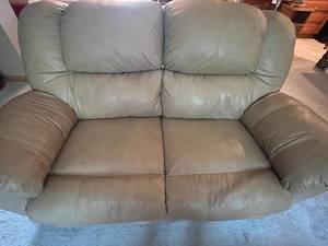 lot 358 image: MAIN - Tan Leather Reclining Loveseat Inc Coca Cola Pillow