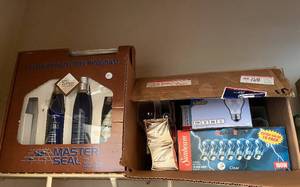 lot 371 image: MAIN - Lot of Assorted Light Bulbs and Leather Protection Program Kit