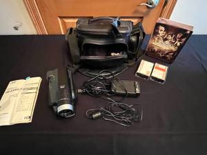 lot 394 image: MAIN - JVC Compact VHS Camcorder GR-AXM225 with Accessories and Deadwood Season 1