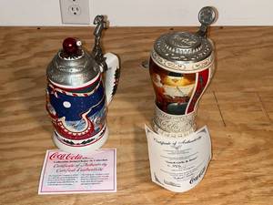 lot 7 image: BASEMENT - Lot of 2 Coca-Cola Collectible Christmas Steins with Certificates of Authenticity