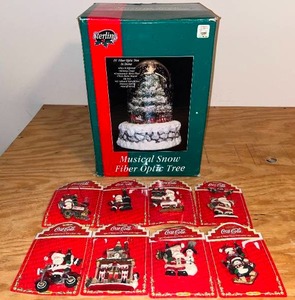 lot 16 image: BASEMENT - Coca-Cola Christmas Ornaments and Sterling Musical Snow Fiber Optic Tree