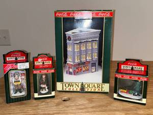 lot 25 image: BASEMENT - Coca-Cola Town Square Collection Figurines and Building