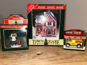 lot 33 image: BASEMENT - Coca-Cola Town Square Collection - Lot of Figurine, Advertising Car & Carlsons General Store