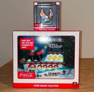 lot 77 image: BASEMENT - Coca-Cola Town Square Collection Set - Includes Crabbys Showboat Restaurant and Figurine