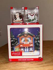 lot 79 image: BASEMENT - Coca Cola Collectible Christmas Ornaments and Town Square Collection