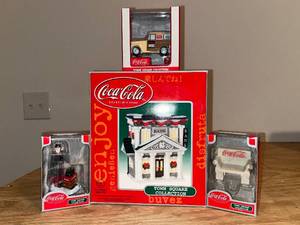 lot 235 image: BASEMENT - Coca-Cola Town Square Collection Figures and Bank
