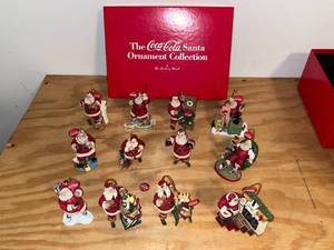 lot 205 image: BASEMENT - The Coca-Cola Santa Ornament Collection by The Danbury Mint