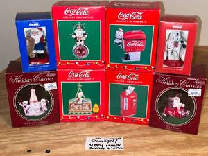 lot 203 image: BASEMENT - Lot of Coca-Cola Holiday Ornaments and Holiday Classics Collectibles