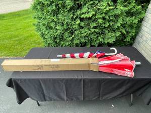 lot 304G image: Lot of 2 Umbrellas - Coca Cola (patio umbrella) and USA Flag (standard umbrella) Designs