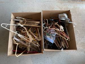 lot 316 image: GARAGE - Lot of Assorted Plastic and Wire Hangers