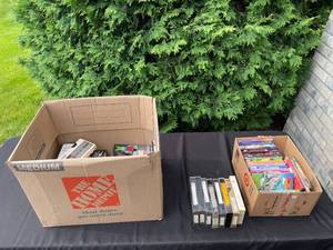 lot 320 image: GARAGE - Large Lot of Mixed Media VHS Tapes and DVDs