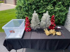 lot 334 image: GARAGE - Holiday Decoration Lot Tinsel Trees, Ornaments, and Storage Bin