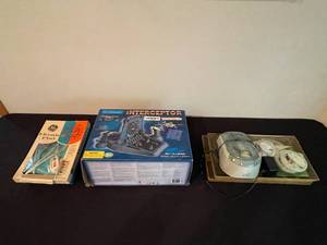 lot 405 image: MAIN - Variety Lot GE Heating Pad, Lexibook Interceptor Game, and Febreze Scentstories Kit