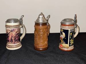 lot 431 image: BASEMENT - Set of 3 Vintage Beer Steins with Pewter Lids