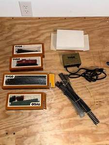 lot 484 image: BASEMENT - Tyco HO Scale Electric Train Set with Transformer and Track Pieces