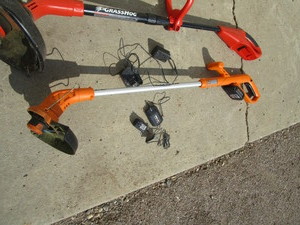 lot 149 image: (2) Cordless Weed Eaters (1) Missing Battery