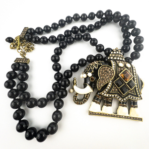 lot 18 image: HEIDI DAUS Michelles Majestic Mr. Elephante Base Metal Beaded Drop Necklace.