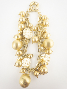 lot 28 image: RIVKA FRIEDMAN Oval Rolo Disc 18K Yellow Gold Plated Charm Bracelet.