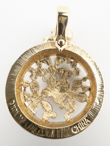 lot 34 image: NOLAN MILLER Tuscany Multi-Colored Flower Gold Plated Base Metal Enhancer.