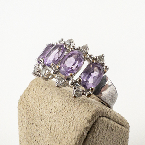 lot 52 image: Five Amethyst With CZ Silver Tone Base Metal Ring. Size 9 - 9.25.