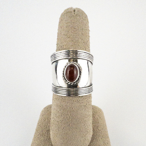 lot 60 image: Wide Oval Cut GarnetCarnelian Sterling Silver Ring. Size 7.25 - 7.5.