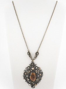 lot 86 image: Victorian Trading Co Large Orange Rhinestone Rose Filigree base Metal Statement Necklace.