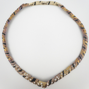 lot 90 image: Tiger Striped Orange, Pink & Yellow Rhinestone Base Metal Necklace.