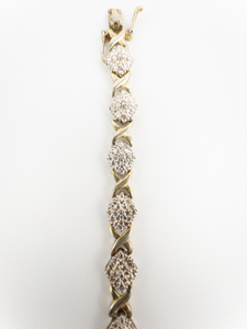 lot 95 image: OTC International Vintage Two-Tone Sterling Silver Tennis Bracelet. 