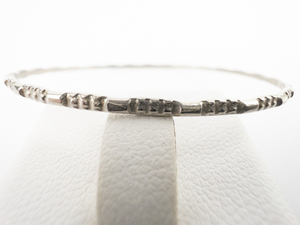 lot 96 image: Tiny Textured Base Metal Baby Bangle Bracelet.